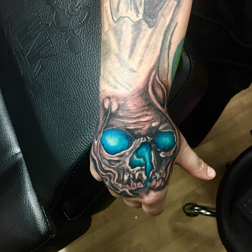 Explore mardi gras mask tattoo ideas, creative tattoo ideas in Anniston, available at Infinity Ink