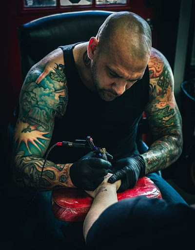 Explore female half sleeve tattoo ideas, creative tattoo ideas in Oak Grove, available at Purgatory Tattoos