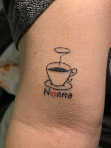 Explore godfather tattoo ideas, creative tattoo ideas in Corona, available at Crop Circles Tattoo Studio