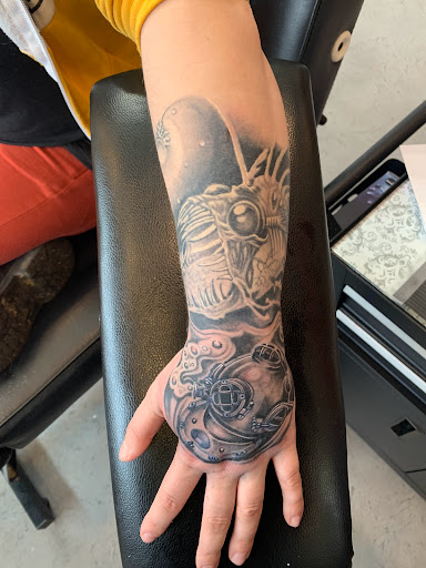 Explore simple fish tattoo ideas, creative tattoo ideas in Great Falls, available at Alpha Tattoos & Piercings