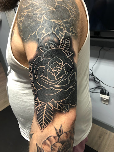 Explore snake tattoo idea, creative tattoo ideas in Englewood, available at Point of Entry Tattoo