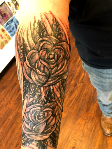 Explore guy wrist tattoo ideas, creative tattoo ideas in Seymour, available at American Gypsy Tattoo Corp.