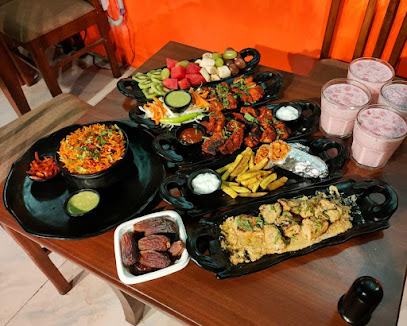 Mezbaan Fine Dine Restaurant - SBI lane, Residency Road, Lal Chowk, Srinagar, Jammu and Kashmir 190001