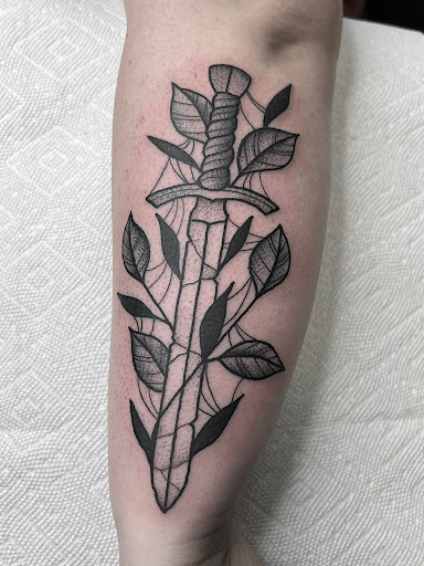 Explore ideas for matching couple tattoos, creative tattoo ideas in Elkin, available at Black Bear Tattoo