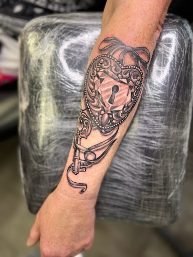 Explore sleeve tattoo cover up ideas, creative tattoo ideas in Abilene, available at Lino Ink Tattoo Studio