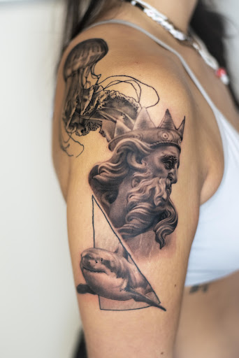 Explore simple neck tattoo ideas, creative tattoo ideas in Independence, available at Bare Skin Tattoo