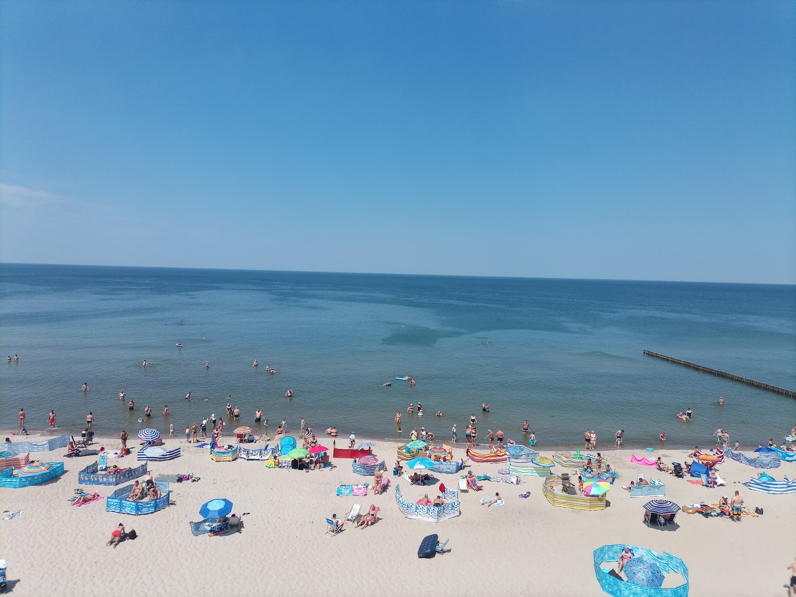 Foto av Rewal Beach med hög nivå av renlighet