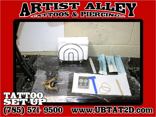 Explore wedding ring tattoo cover up ideas, creative tattoo ideas in Topeka, available at Artist Alley Studio Tattoos & Piercings