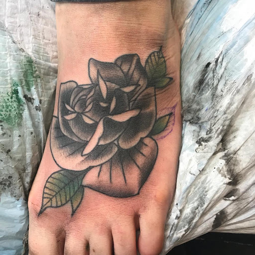 Explore bikini line tattoo ideas, creative tattoo ideas in Concord, available at The Gallery Tattoo Studio