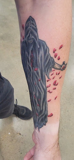 Explore domestic violence tattoo ideas, creative tattoo ideas in Maryland Heights, available at Thirteen Roses Tattoo & Aesthetics