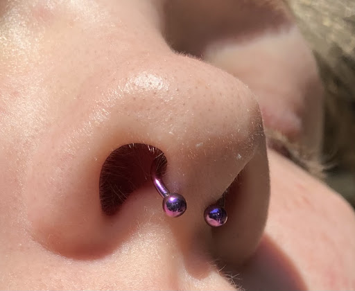 Explore sunflower and butterfly tattoo ideas, creative tattoo ideas in Summerville, available at Exotic Impressions Body Piercing