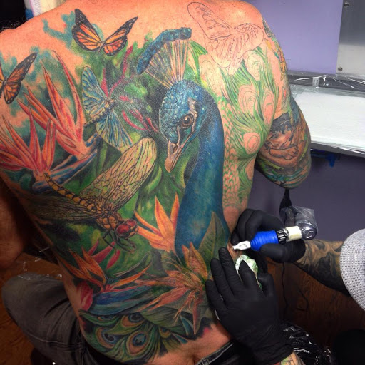 Explore western tattoo ideas for men, creative tattoo ideas in Edgewood, available at Evolved Body Arts