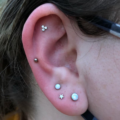 Explore jekyll and hyde tattoo ideas, creative tattoo ideas in Grand Rapids, available at IRIS Piercing Studio