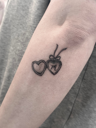 Explore sacred heart tattoo ideas, creative tattoo ideas in Springfield, available at Triumph Tattoo