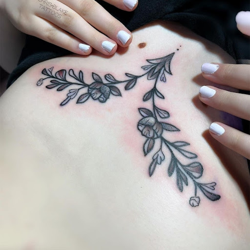 Explore inner ear tattoo ideas, creative tattoo ideas in Longview, available at Fugis Tattoo Shop