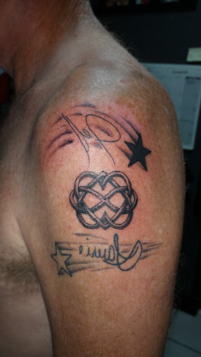Explore gabriel tattoo ideas, creative tattoo ideas in Foley, available at Black Sheep Custom Tattoos and Piercings