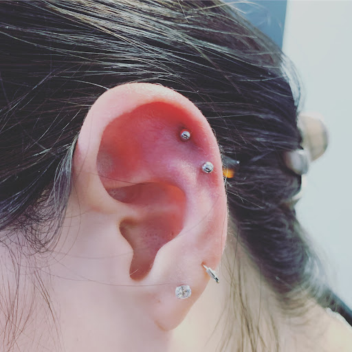 Explore tattoo ideas sun and moon, creative tattoo ideas in Round Rock, available at Piercings by Toni