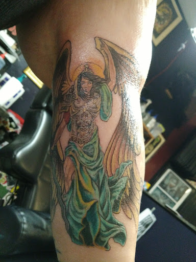 Find harley quinn tattoo ideas for your next unique tattoo in Fayetteville at Chop Shop Tattoo