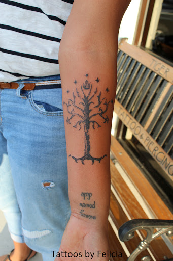 Explore cross tattoo ideas for females, creative tattoo ideas in Fort Myers, available at Tiger Lotus Tattoo and Piercing