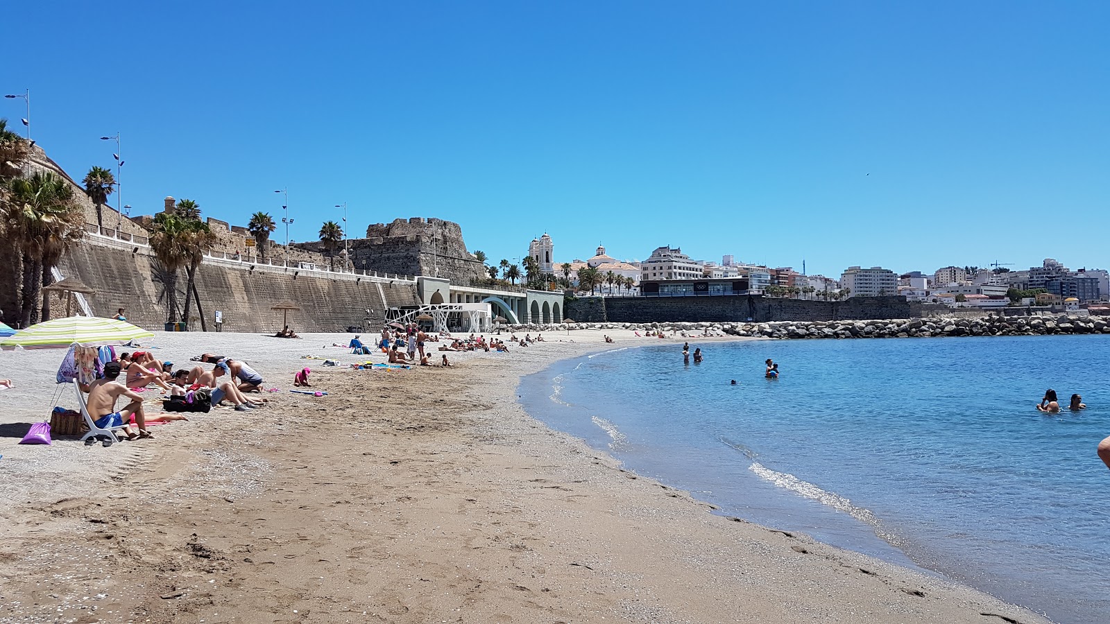 Foto af Playa del Chorillo med brun fin sten overflade