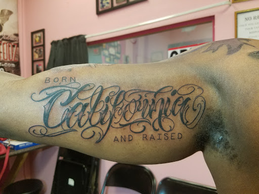 Explore leg tribal tattoo ideas, creative tattoo ideas in West Memphis, available at Amazon Tattooz LLC