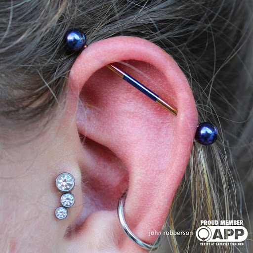 Explore insanity tattoo ideas, creative tattoo ideas in Fort Myers, available at Tiger Lotus Tattoo and Piercing