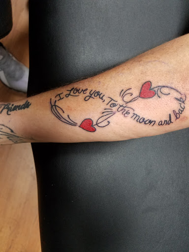 Explore hairdresser tattoo ideas, creative tattoo ideas in Kingsland, available at Second Skin Tattoo