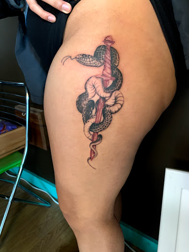 Explore tattoos for your son ideas, creative tattoo ideas in Birchwood, available at Old Soul Tattoo Studio, Llc