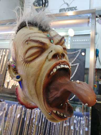 Explore tribal tattoo ideas for guys, creative tattoo ideas in Flushing, available at Silver Image