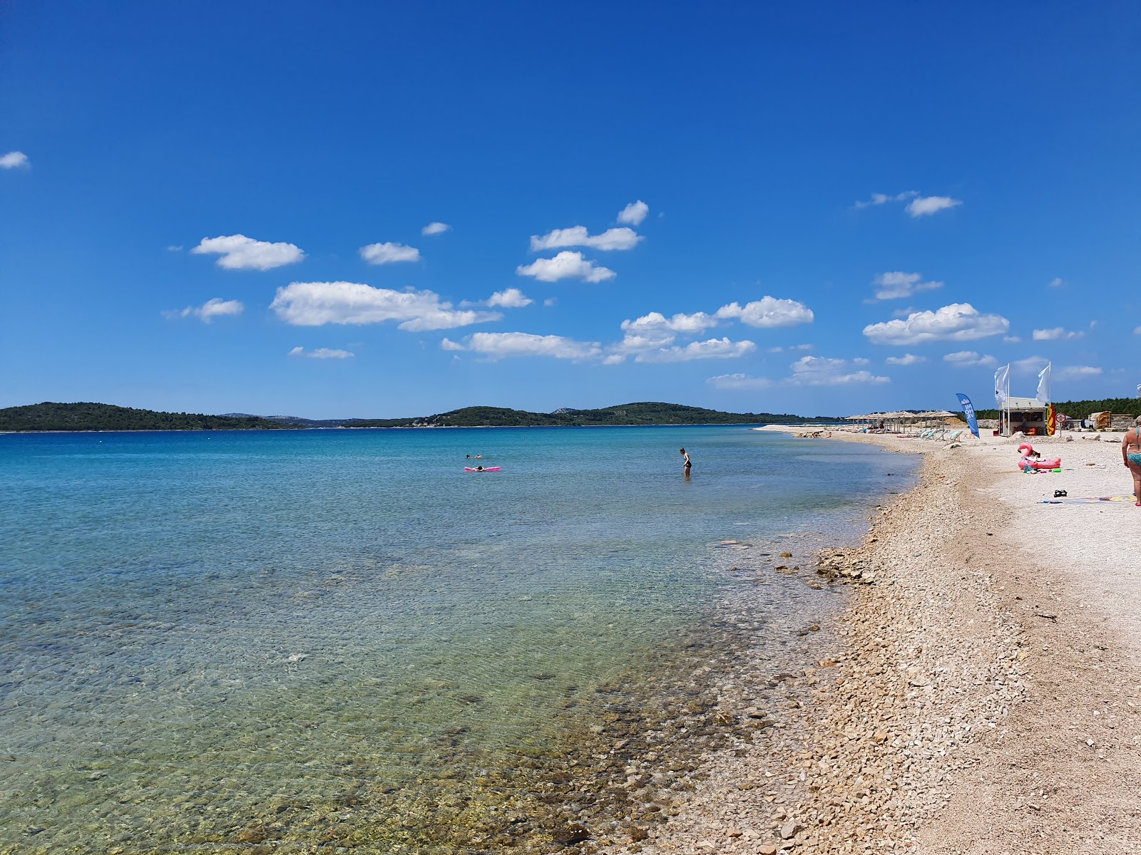 Foto av Olive beach med lätt sten yta
