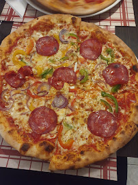 Pizza du Pizzeria Au Bouquet à Ivry-sur-Seine - n°10