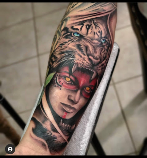 Find lesbian couple tattoos ideas for your next unique tattoo in Lake Alfred at Moreira Ink