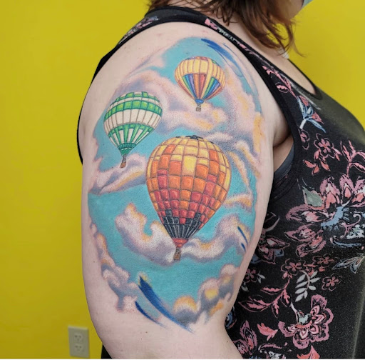 Explore black and white tattoo ideas, creative tattoo ideas in Houston, available at The Electric Chair Tattoo & Piercing