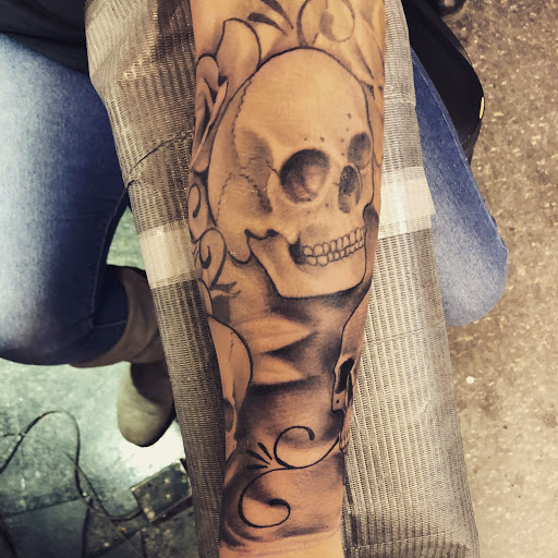 Explore cervical cancer tattoo ideas, creative tattoo ideas in Westland, available at Skin Sinn tattoos