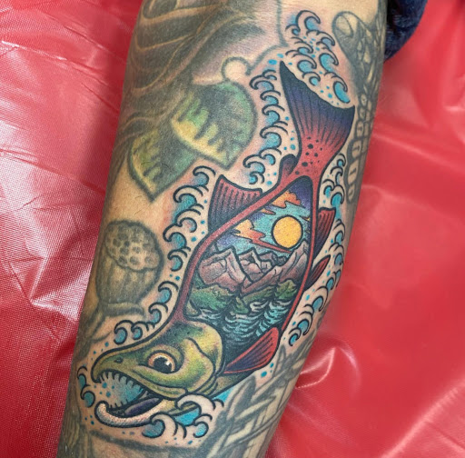 Explore back arm tattoo ideas, creative tattoo ideas in Whitefish, available at Cutthroat Tattoo