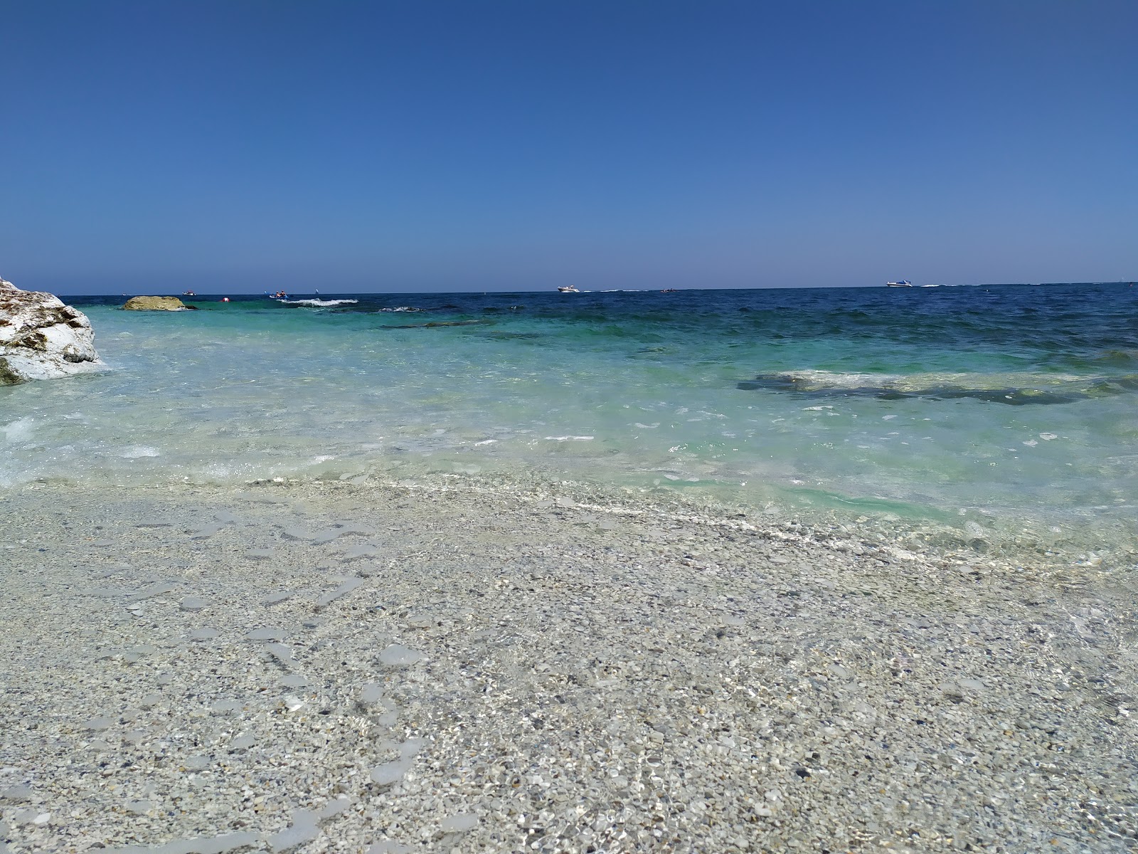 Foto van Spiaggia dei Sassi Bianchi met hoog niveau van netheid