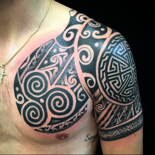 Explore chest tattoo ideas woman, creative tattoo ideas in Strasburg, available at Champion Tattoo Company