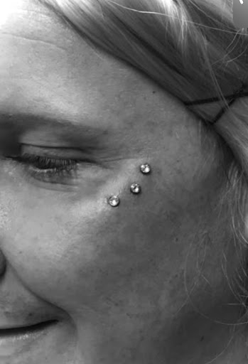 Explore tummy tuck tattoo ideas female, creative tattoo ideas in Logan, available at Surreal Ink Tattoo & Body Piercing