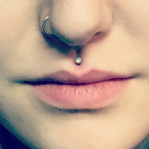 Explore face tattoo ideas for females, creative tattoo ideas in Memphis, available at Studio 42