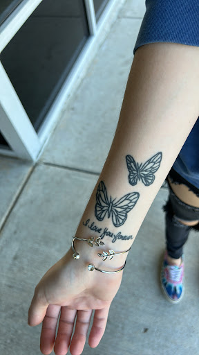 Explore throat tattoo ideas, creative tattoo ideas in Virginia Beach, available at Blue Horseshoe Tattoo & Piercing