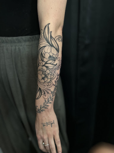 Find small cat tattoo ideas for your next unique tattoo in Wasilla at Doulos Tattoo, The Tattoo Shop