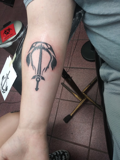 Explore unique side thigh tattoo ideas, creative tattoo ideas in Longview, available at Fugis Tattoo Shop