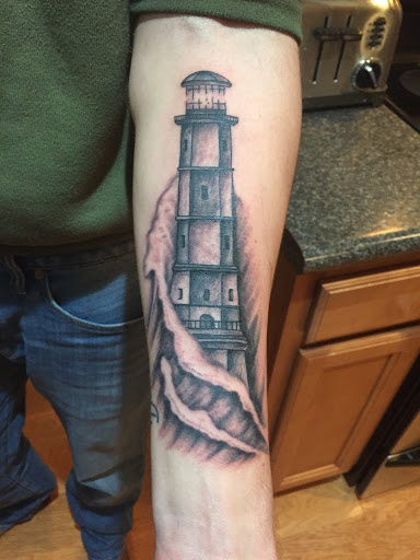 Find bracelet tattoo ideas for females for your next unique tattoo in Brunswick at Blue Fin Tattoos