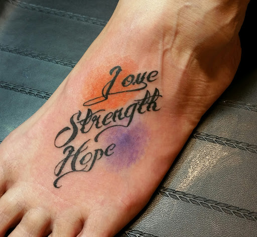 Explore break up tattoo ideas, creative tattoo ideas in Foley, available at Black Sheep Custom Tattoos and Piercings