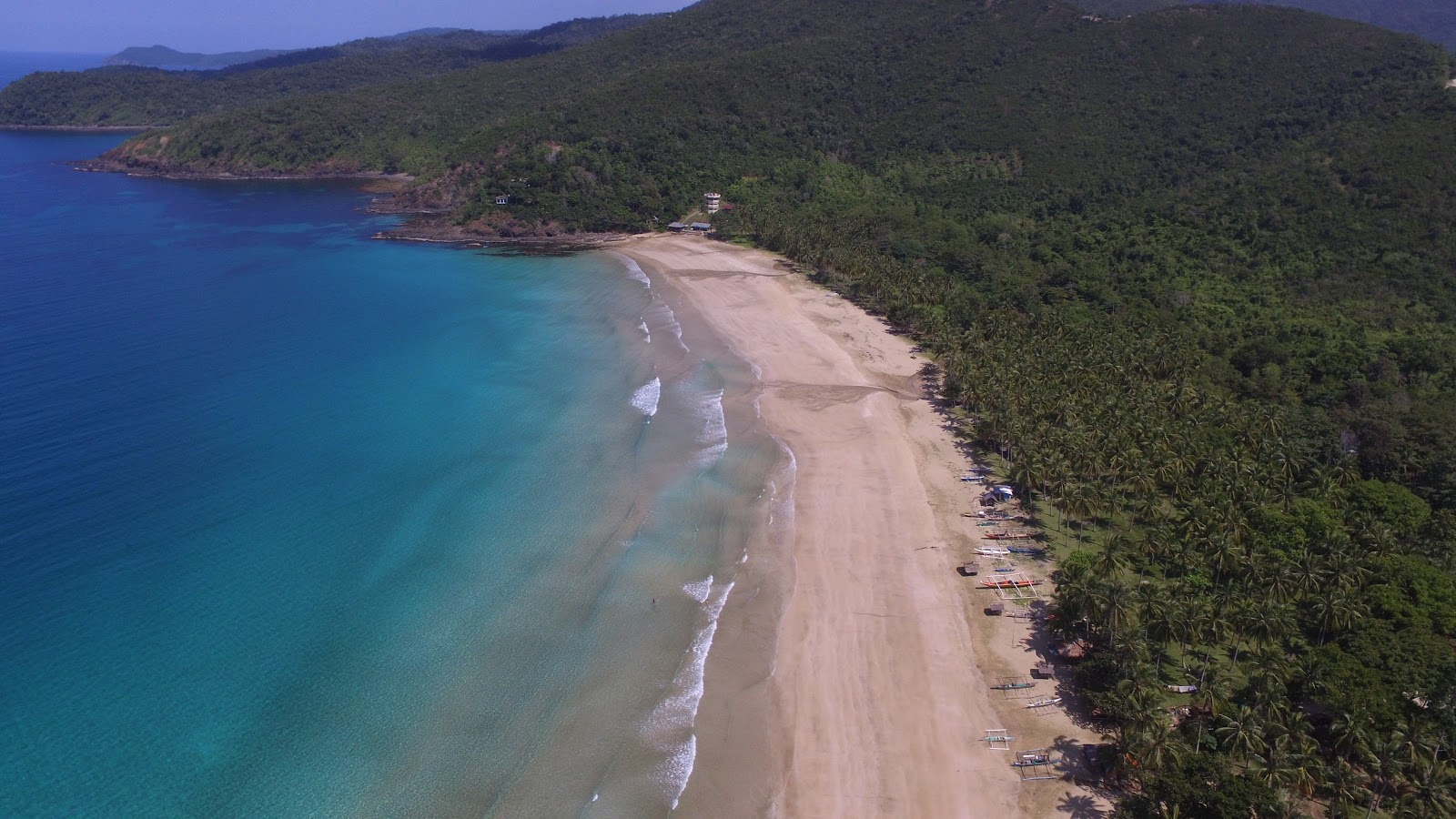 Foto de Praia de Nagtabon - lugar popular entre os apreciadores de relaxamento