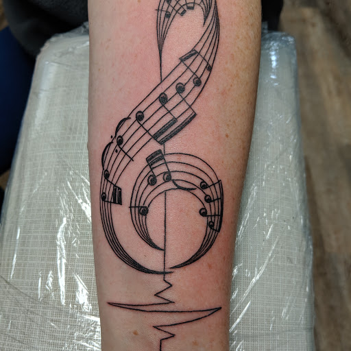 Explore breastfeeding tattoo ideas, creative tattoo ideas in Tewksbury, available at Lucid Arts Tattoo Studio