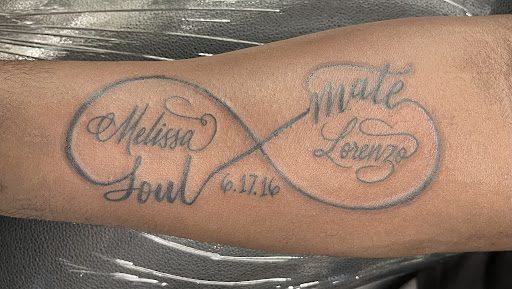 Explore family flower tattoo ideas, creative tattoo ideas in Douglasville, available at Long Island Ink Tattoo & Piercing