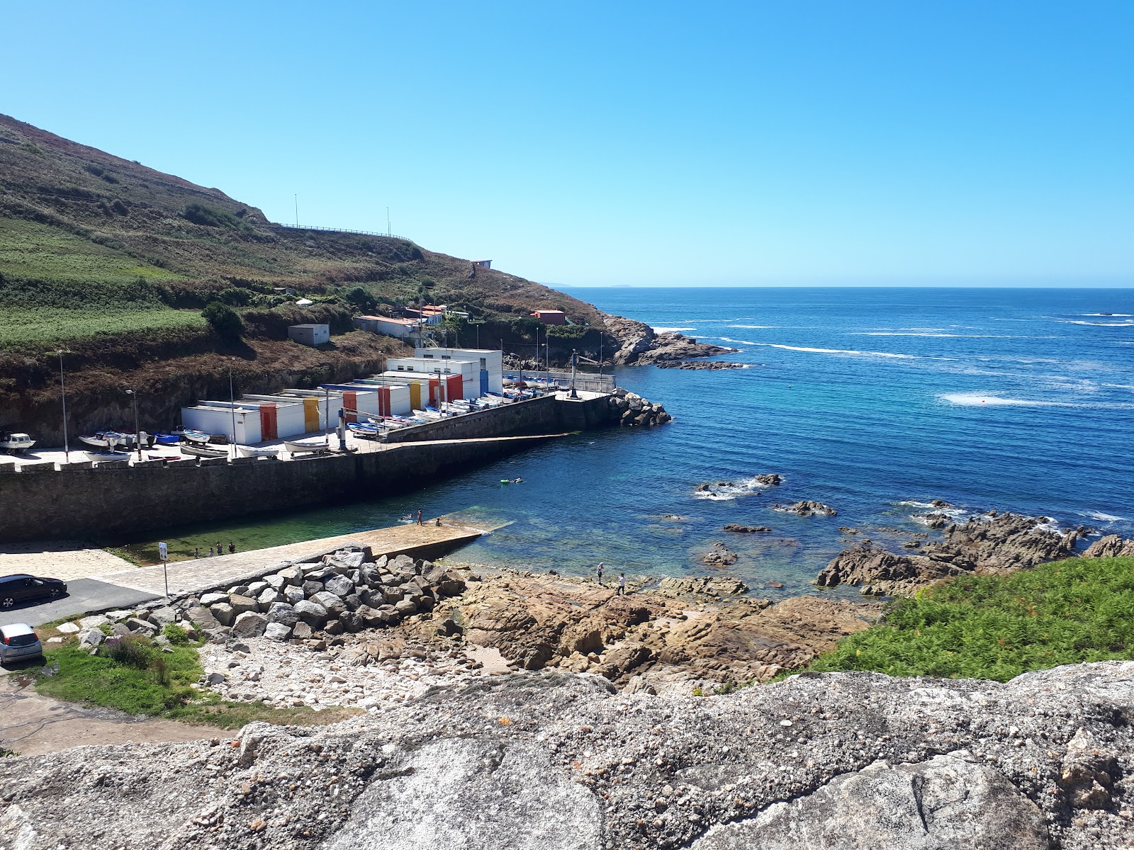 Foto di Cala do Portino con una superficie del sabbia beige