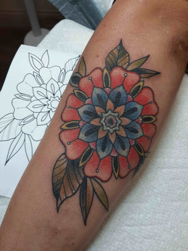 Explore push tattoo ideas, creative tattoo ideas in Lakeview, available at Backwoods Tattoo Studio