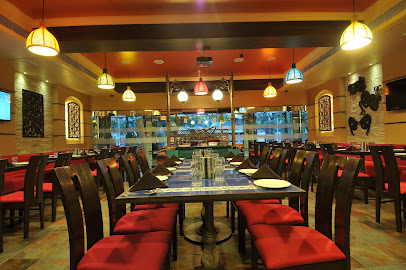 TORITOS Restaurant - Shivalik Building, 104/105, Ambawadi Cir, opp. Bank of Baroda, Panchavati Society, Ambawadi, Ahmedabad, Gujarat 380006, India
